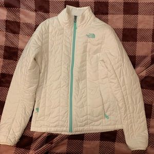 White north face jacket with green logo